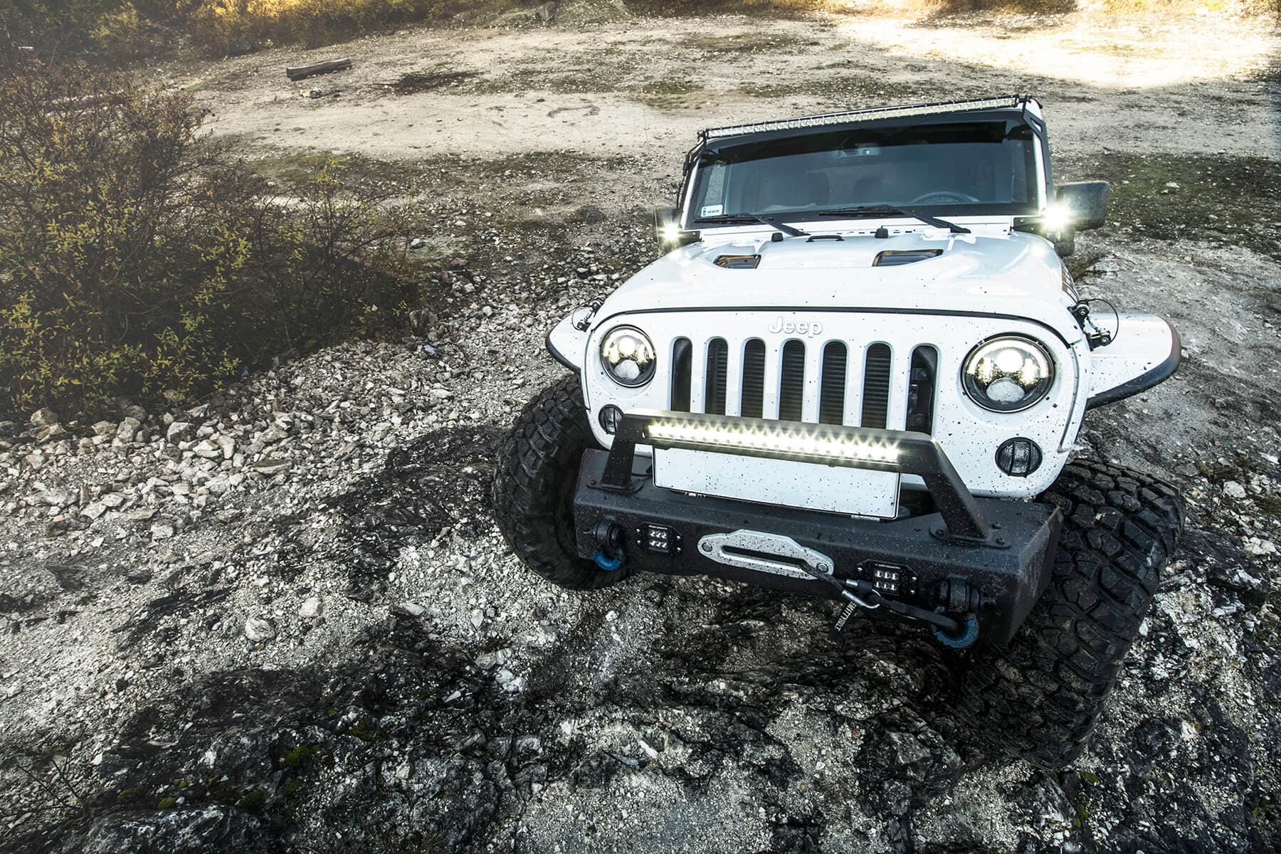 Front bumper with bull bar mounted on Jeep Wrangler JK.